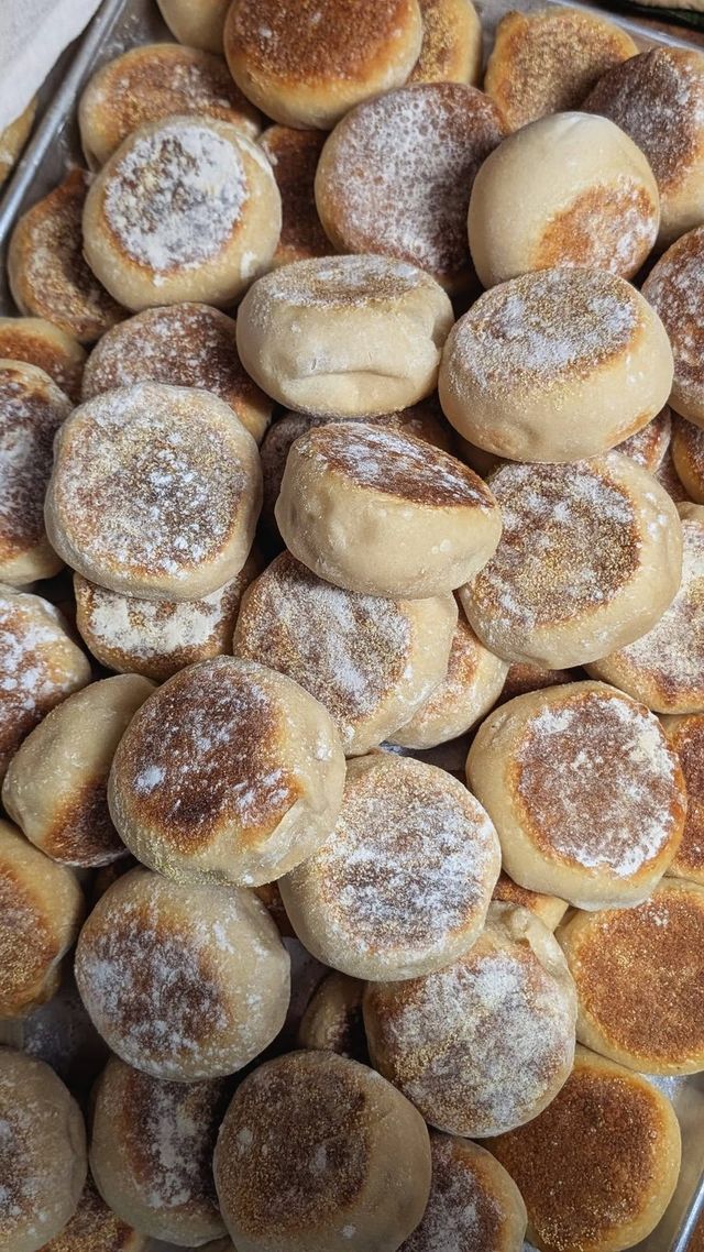 Floury round muffins piled together