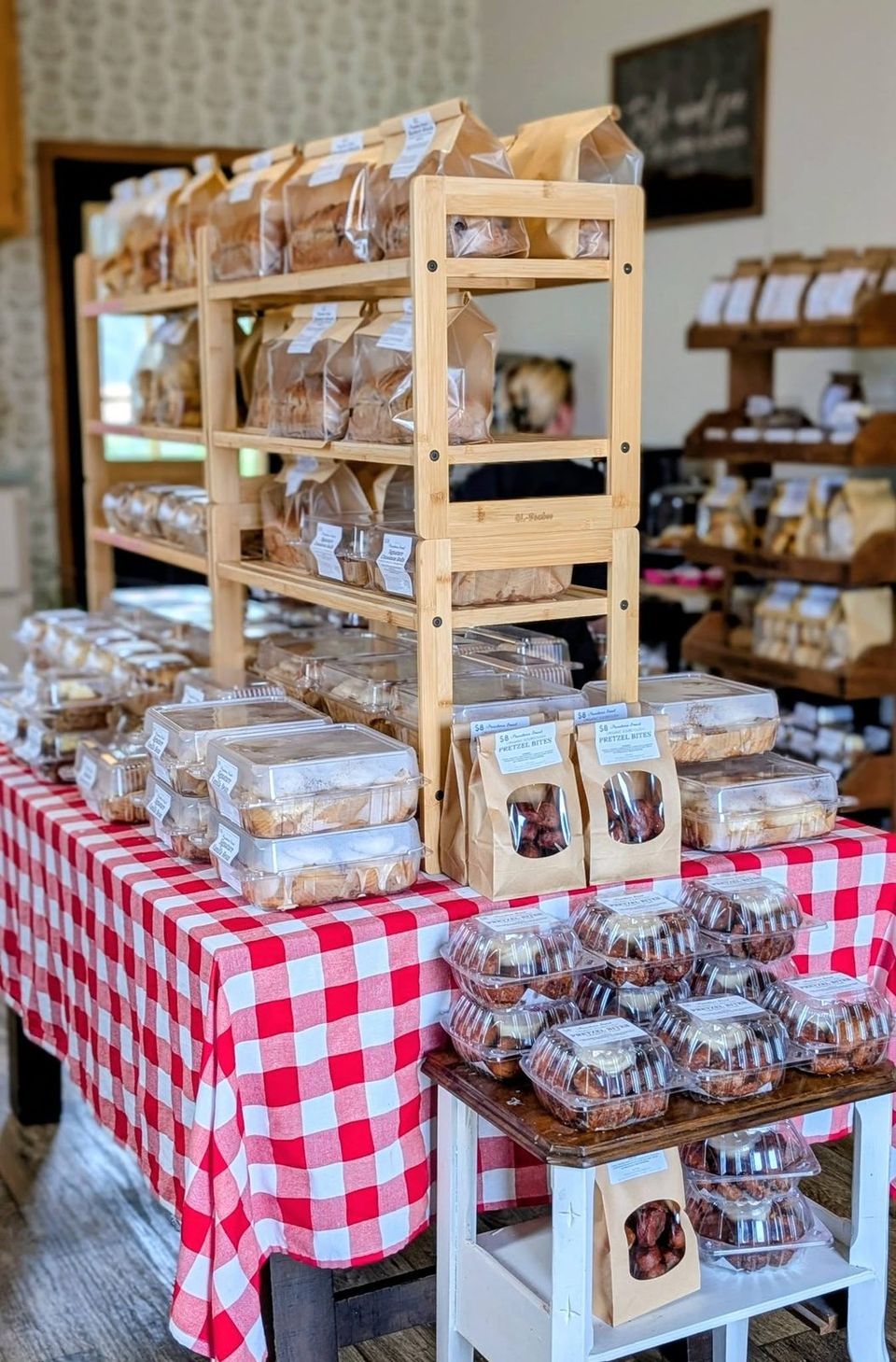 Wrapped bakes on a red gingham table in our shop